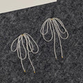 Gentle beaded bow earrings niche high-end sense light luxury temperament design sense earrings 2025 explosion