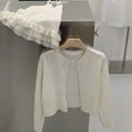 Lotus leaf edge solid color skin-friendly knitted cardigan suspender vest two-piece set
