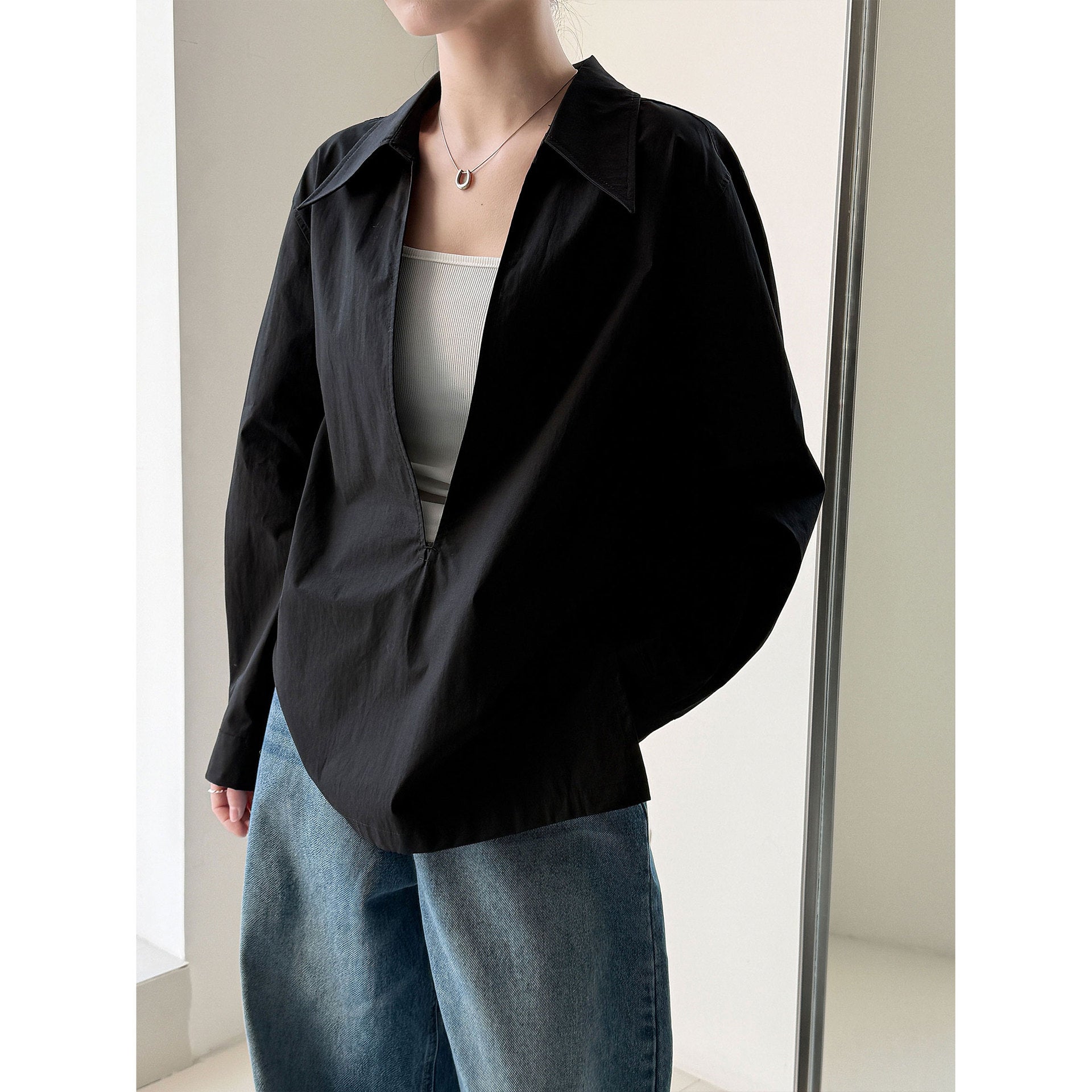 Design sense large v-neck loose casual long-sleeved shirt women's early spring new stacked French top