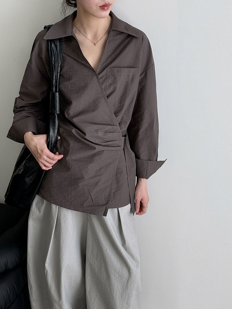 French design sense irregular cross strap shirt women's autumn new niche pleated top