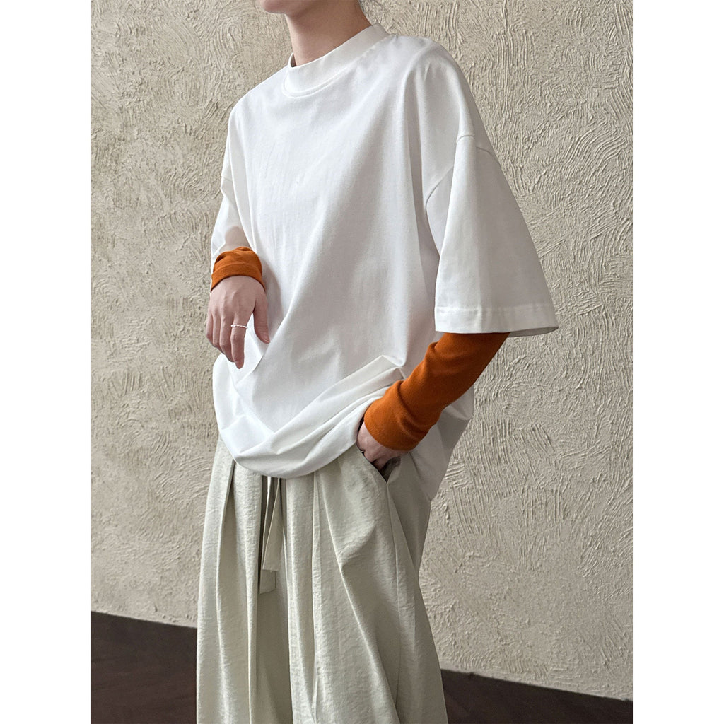 Casual solid color polished loose shoulder short sleeve women's early spring new silhouette simple round neck T-shirt
