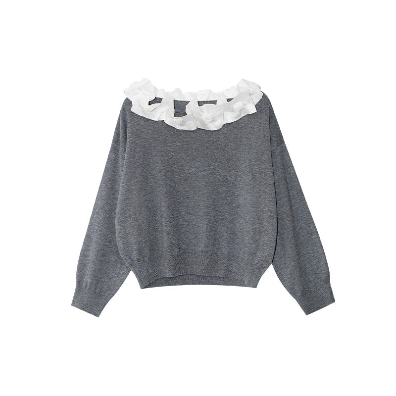 A beautiful lace slanted shoulder open-back knit sweater