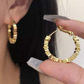 Copper alloy earrings S925 silver needle niche design metal small square broken silver earrings light luxury earrings