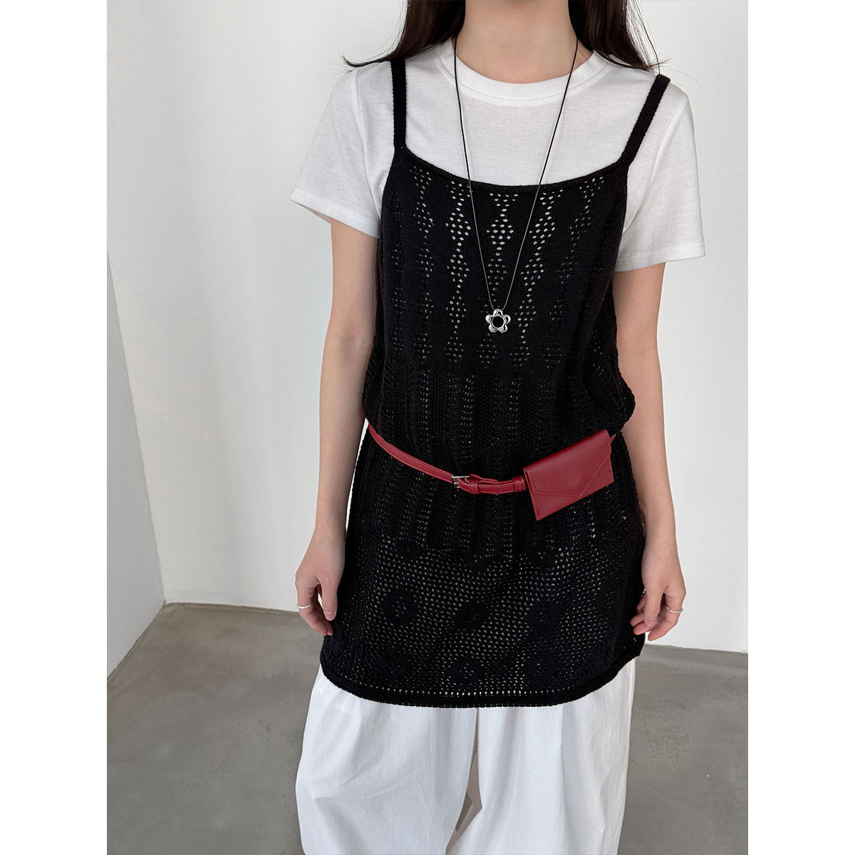 Korean hollow suspender knitted vest skirt women's spring new stacked A-shaped skirt blouse