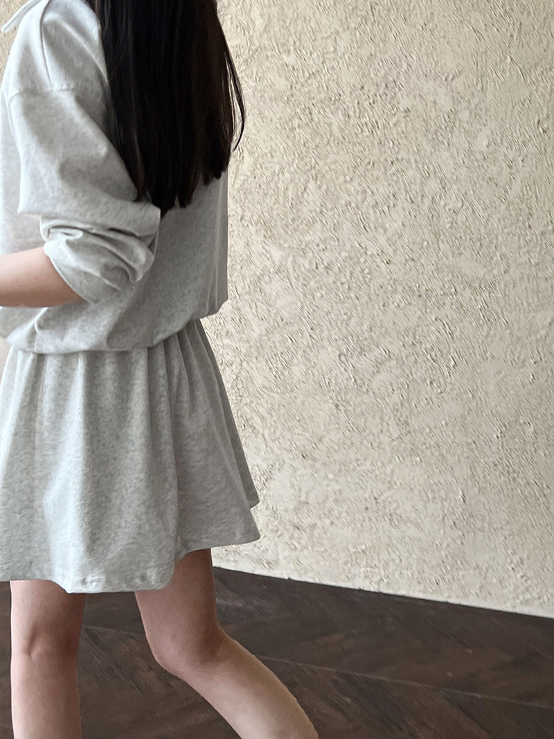 Korean age-reducing suit women's autumn new fake two-piece sweater + elastic skirt two-piece set