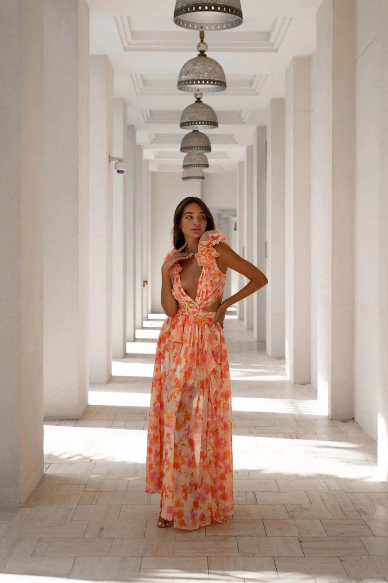 Hollow deep V ruffle edge floral backless dress