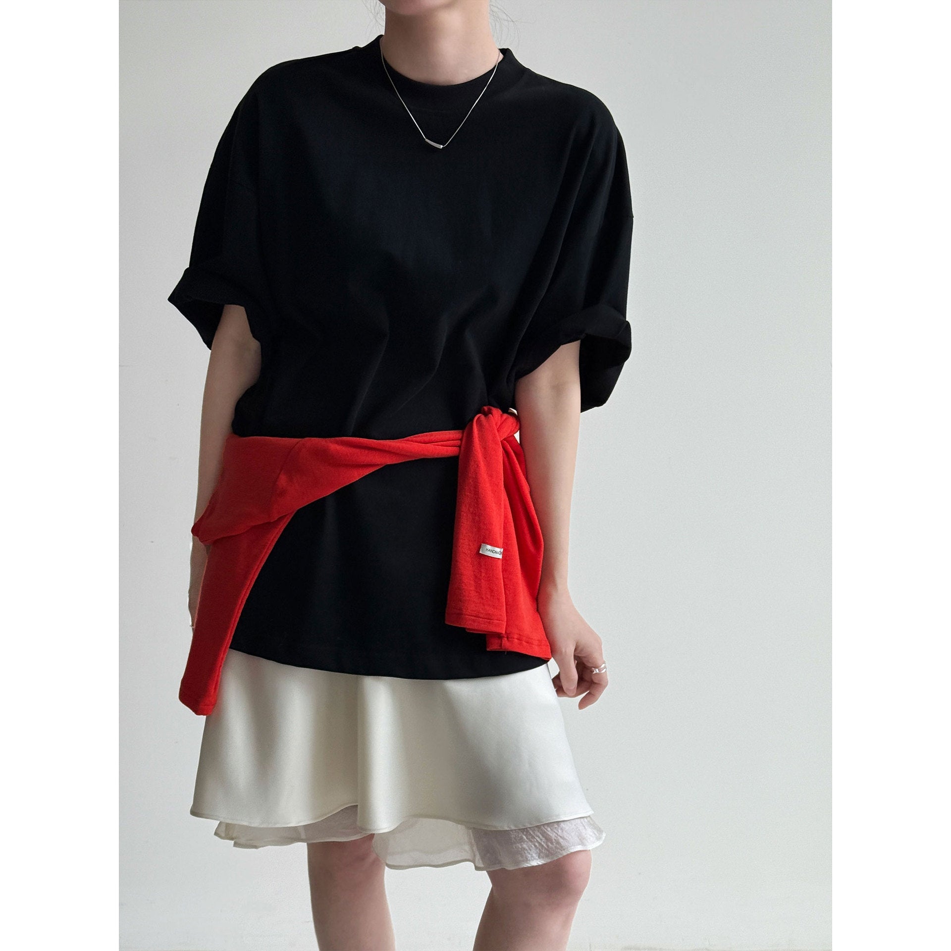 Casual solid color polished loose shoulder short sleeve women's early spring new silhouette simple round neck T-shirt