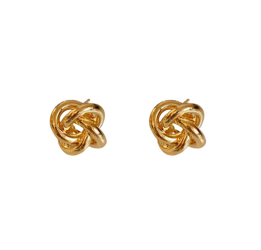 Winding twist Japanese and Korean simple design stud earrings niche versatile hollow earrings metal kink cold wind women's earrings