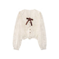 Beautiful age-reducing embroidered bow top