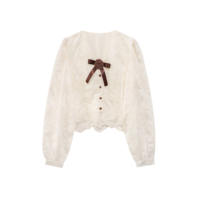 Beautiful age-reducing embroidered bow top