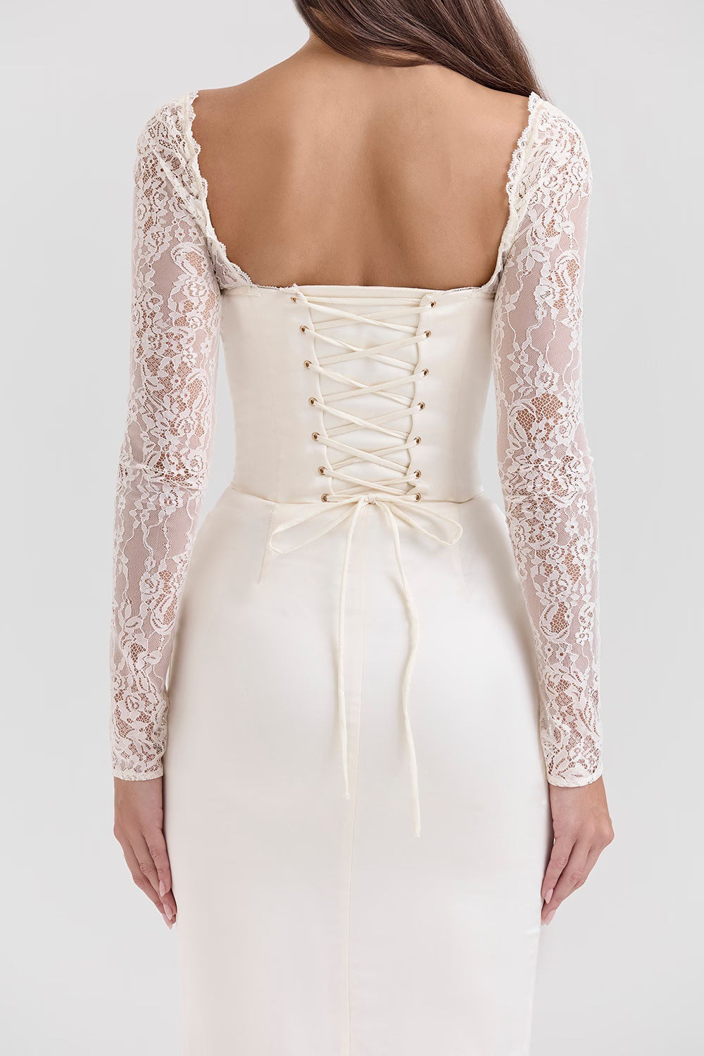 Long skirt with open back lace-up slit