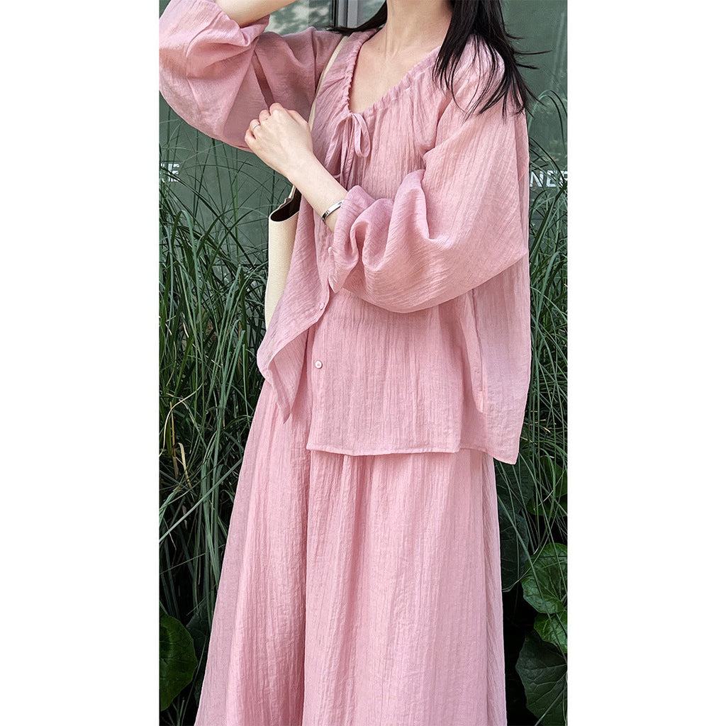 Gentle temperament, drawstring lace-up pleated sunscreen shirt + skirt two-piece resort-style set