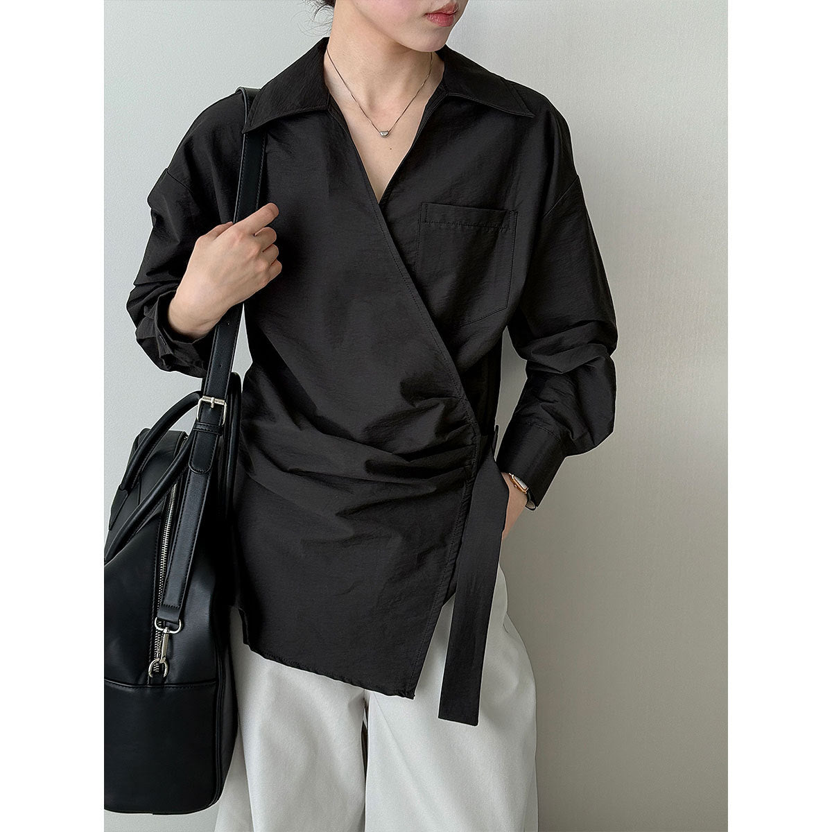 French design sense irregular cross strap shirt women's autumn new niche pleated top