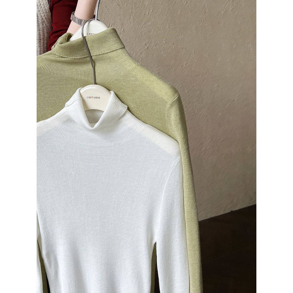Simple knitted sweater women's new turtleneck wool bottoming shirt in autumn and winter