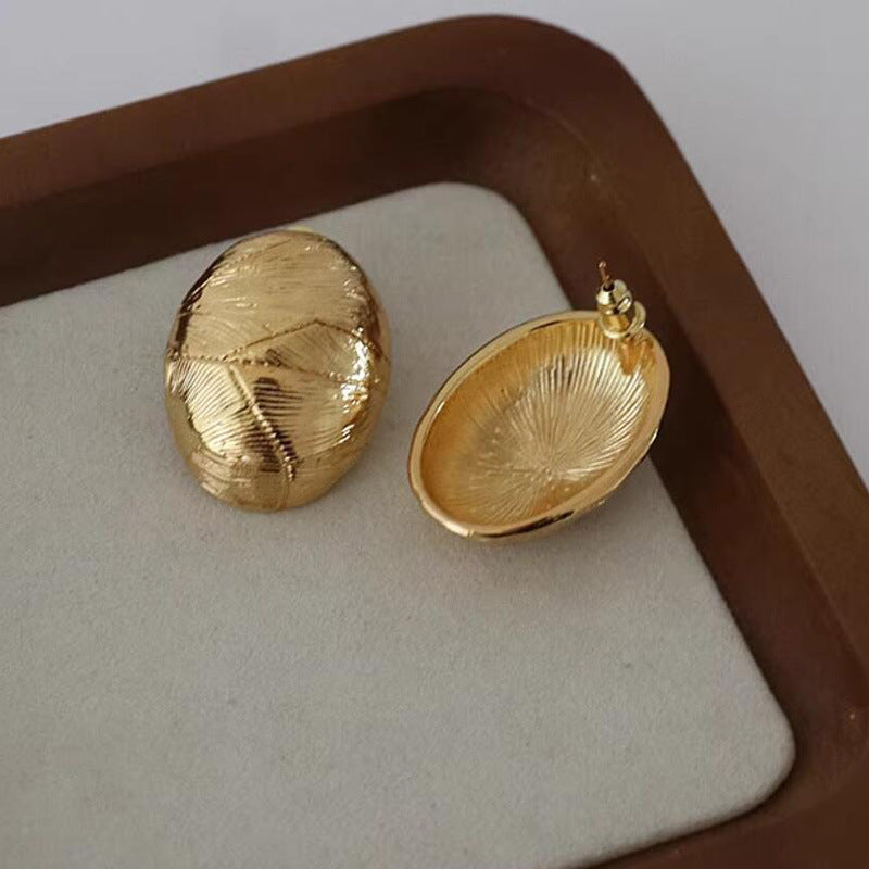 Folded stud earrings exaggerated metal line texture heavy industry earrings fashionable atmosphere ear jewelry