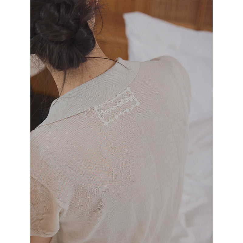 Delicate embroidered lapel single-breasted knitted sweater on the back