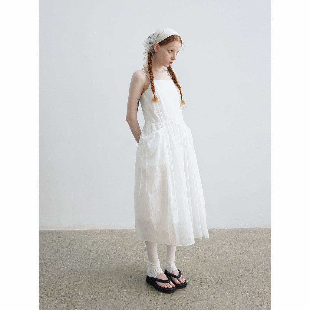 Summer new casual double-root sunscreen light and solid color medium and long suspender dress
