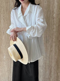 Korean slightly wrinkled texture design shirt women's spring new temperament long-sleeved top