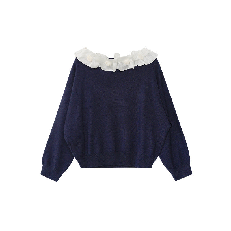 A beautiful lace slanted shoulder open-back knit sweater