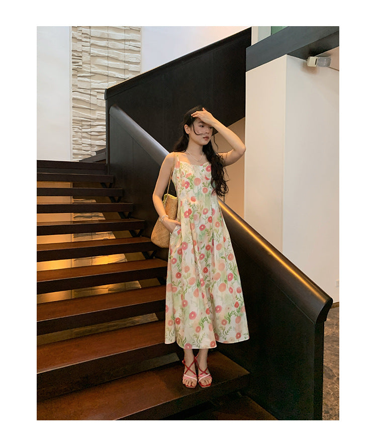 Romantic vacation style age-reducing floral suspender dress