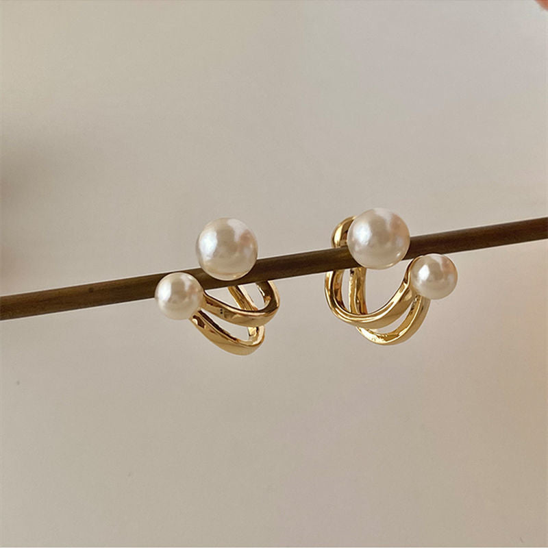 Curved hook pearl earrings New trendy niche design stud earrings Women's sterling silver light luxury high-end versatile earrings