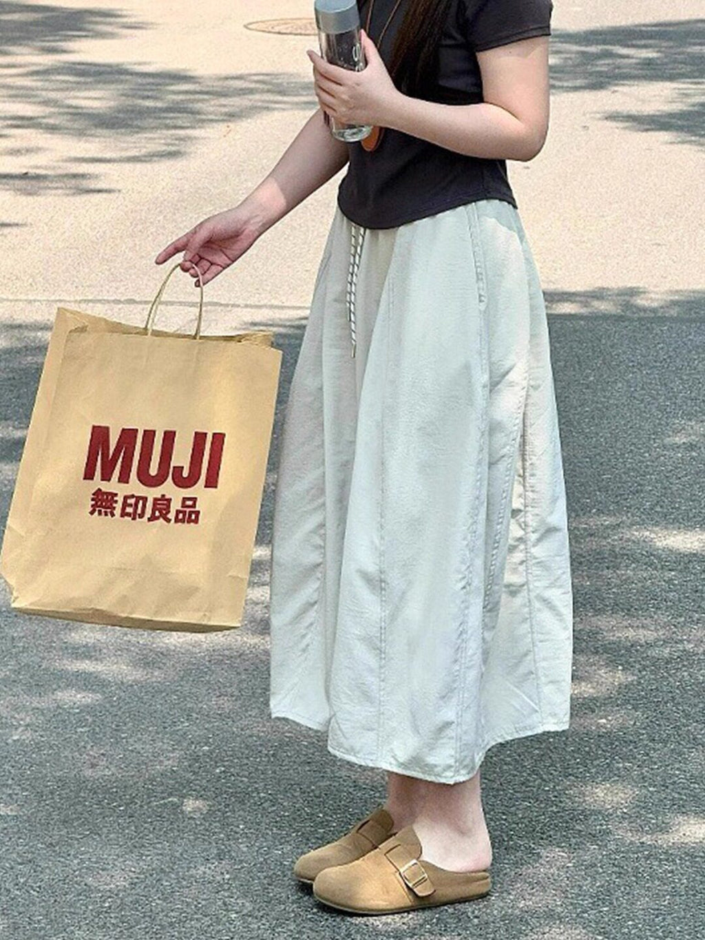 Small tooling skirt women's 2026 summer new high waist to cover the belly pumpkin drape a word bud skirt tide