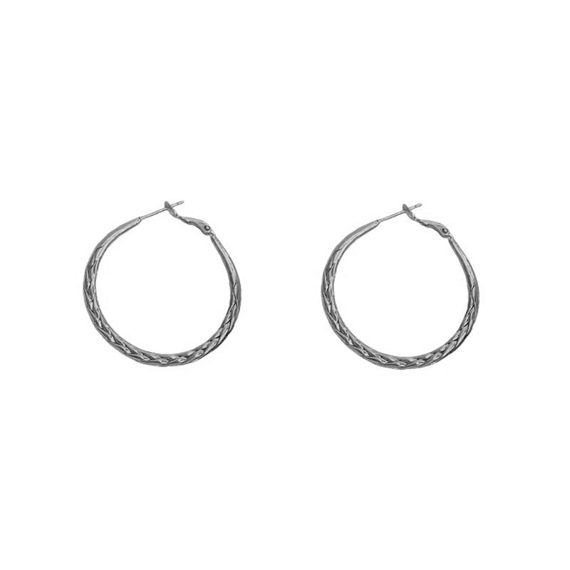 Versatile earrings French retro metal woven pattern niche temperament personalized earrings