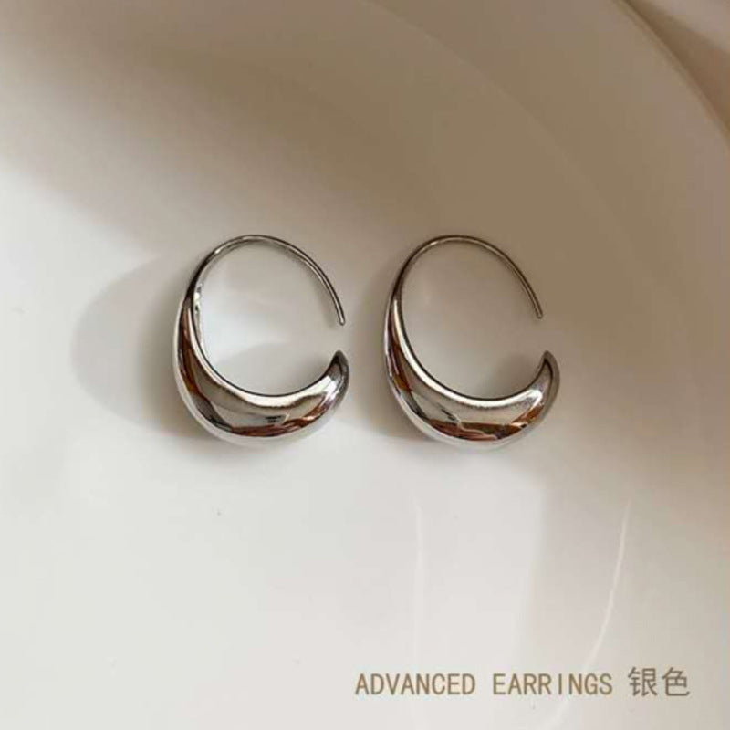 Personality simple smooth cold wind earrings Korean temperament style fashion light luxury design sense small earrings women