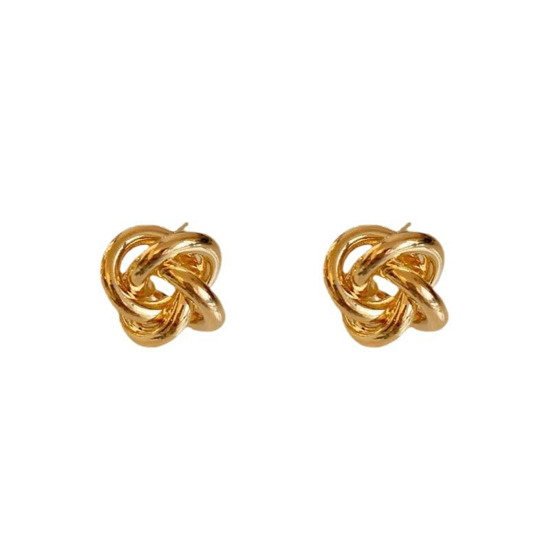 Winding twist Japanese and Korean simple design stud earrings niche versatile hollow earrings metal kink cold wind women's earrings