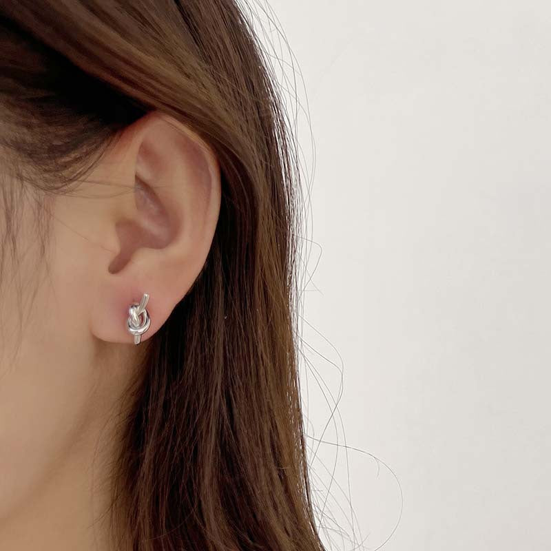 Retro simple cold wind earrings knotted mosquito coil disc earclips versatile temperament geometric irregular earrings