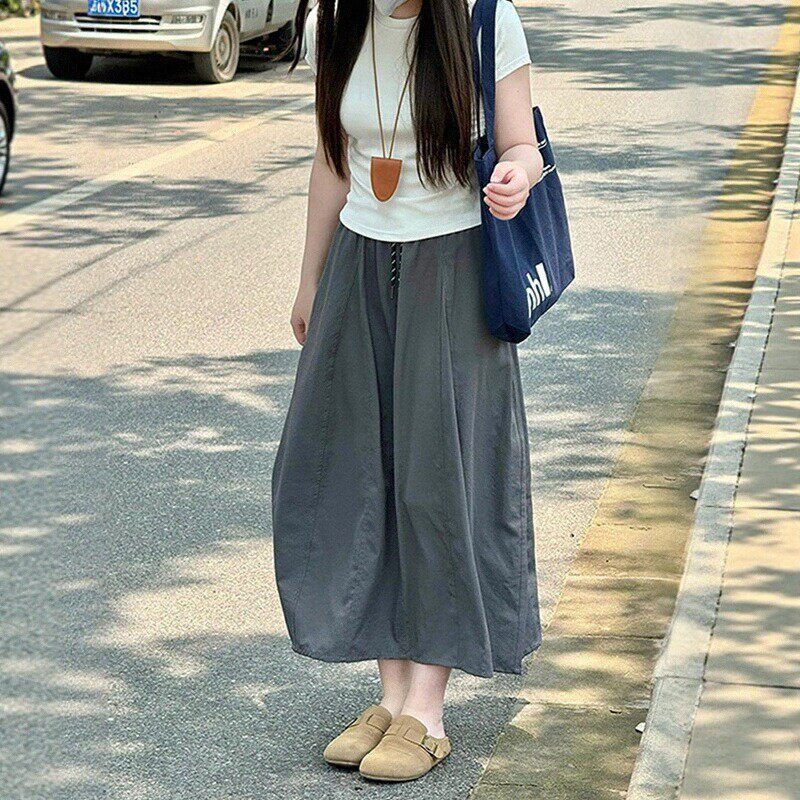 Small tooling skirt women's 2026 summer new high waist to cover the belly pumpkin drape a word bud skirt tide