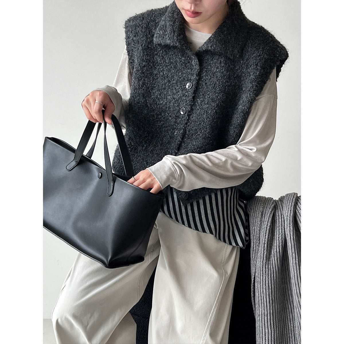 Simple temperament stand-up collar soft waxy wool knitted vest women's autumn new stacked lazy vest