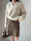 Gentle soft waxy pulled V-neck knitted sweater women's new lazy wind wool warm sweater in winter