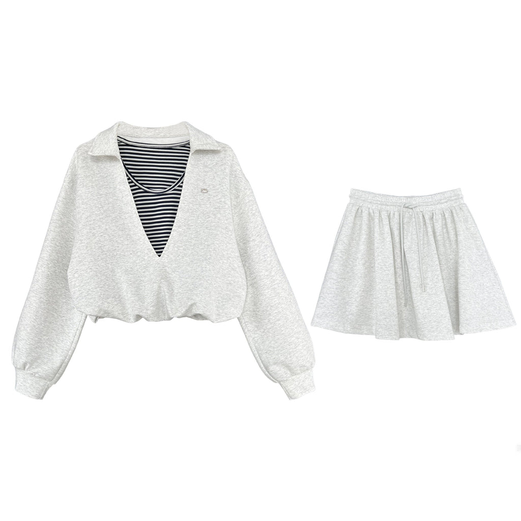 Korean age-reducing suit women's autumn new fake two-piece sweater + elastic skirt two-piece set