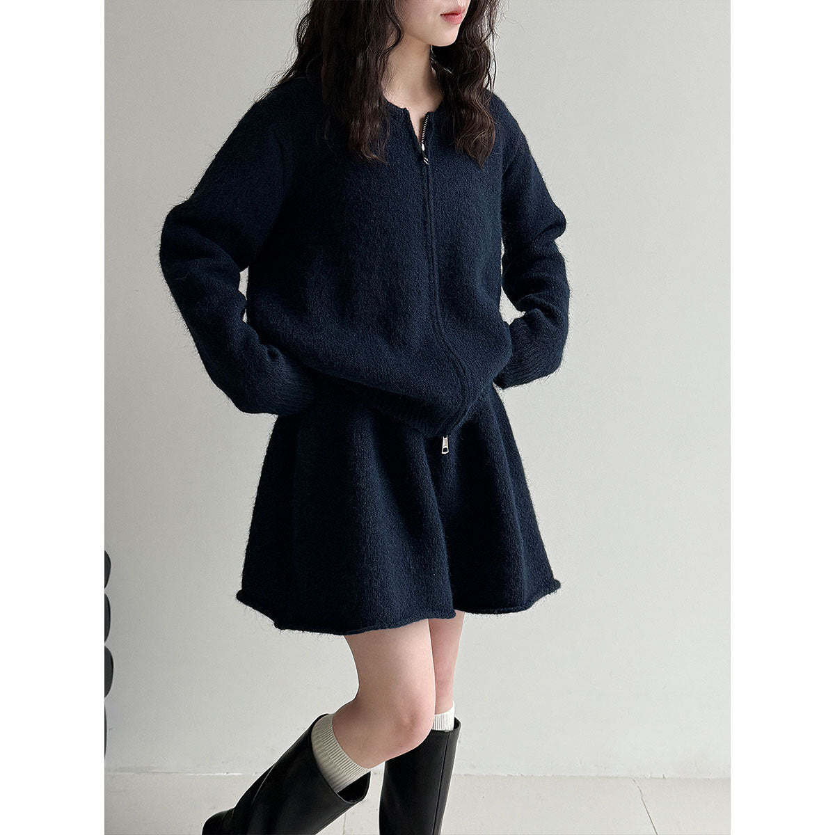 Korean soft waxy casual knitted sweater set for women's winter new curled A-word short skirt two-piece set