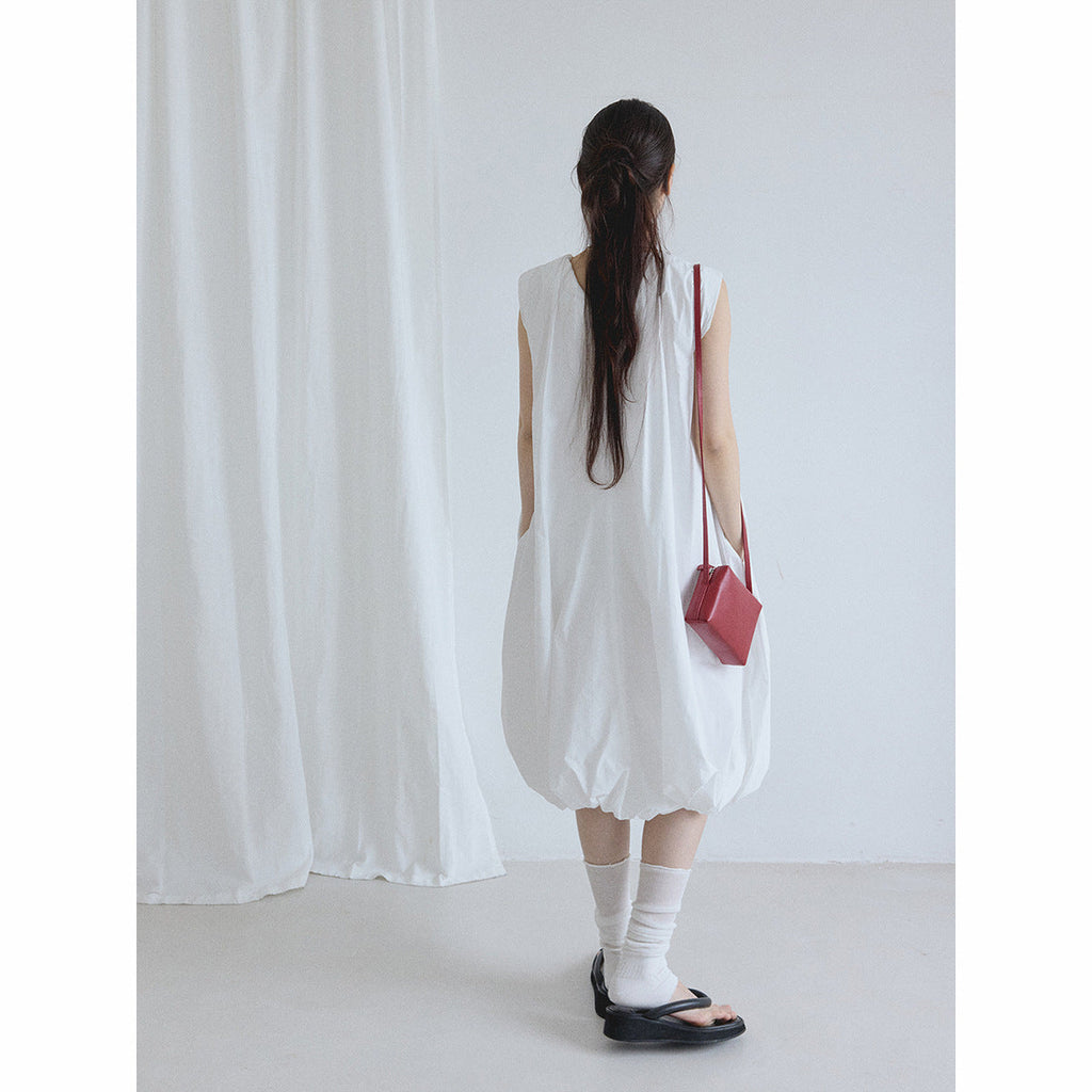 Summer new casual round neck easy and simple small fly sleeves solid color vest bubble skirt