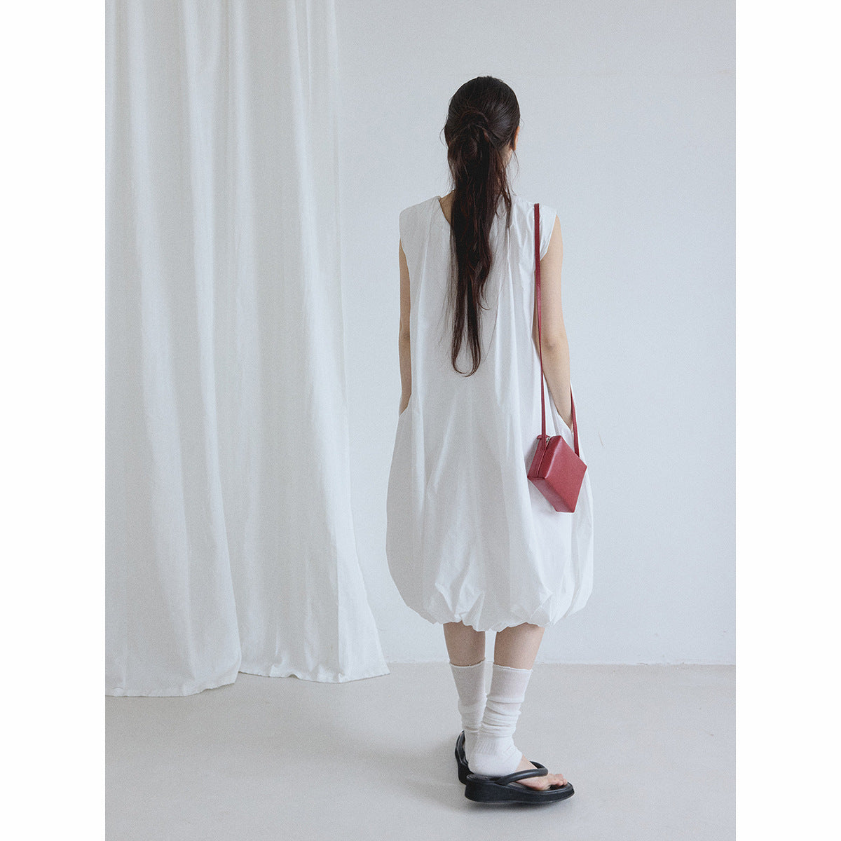 Summer new casual round neck easy and simple small fly sleeves solid color vest bubble skirt