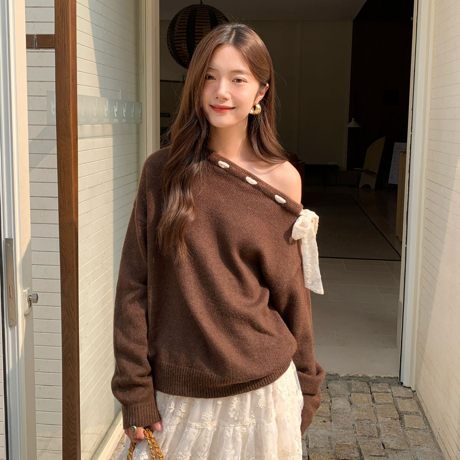 Autumn and winter French atmosphere leopard print strap design diagonal neck off-the-shoulder sweater women