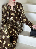 French high-end long-sleeved floral shirt + A-shaped split skirt two-piece set of relaxation suit for women