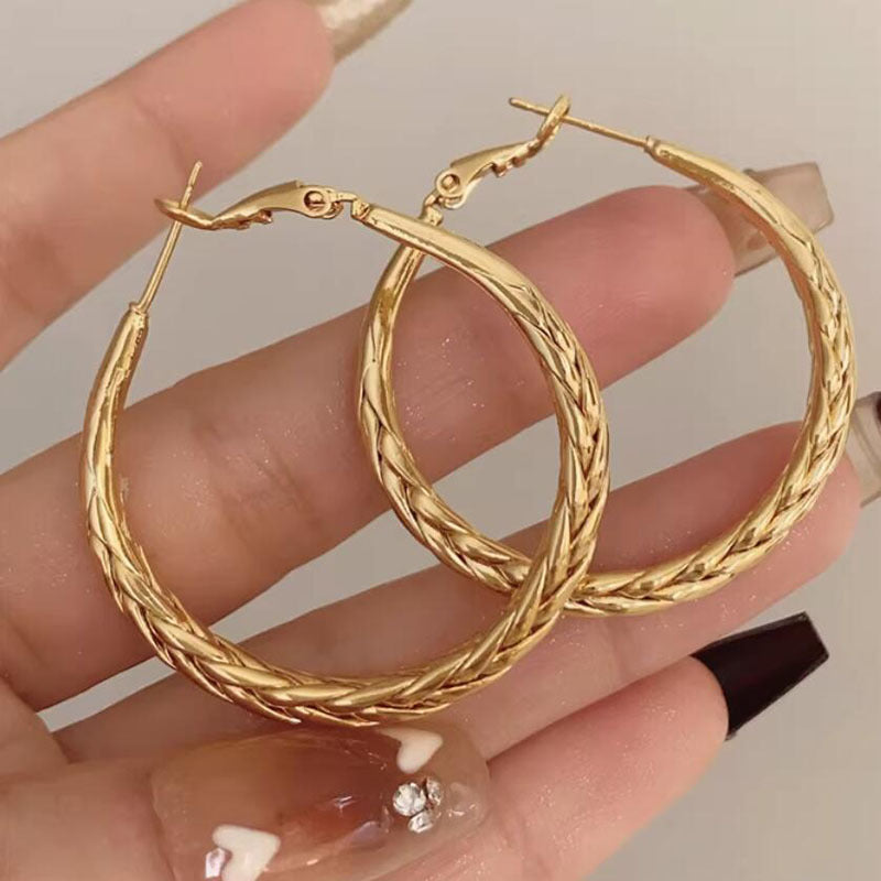 Versatile earrings French retro metal woven pattern niche temperament personalized earrings