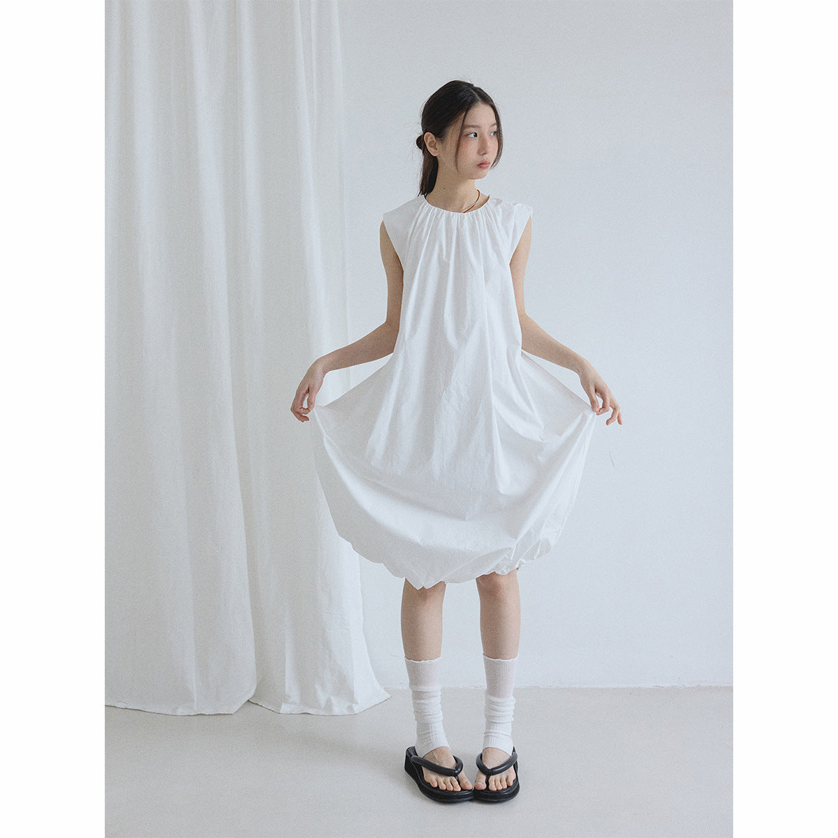 Summer new casual round neck easy and simple small fly sleeves solid color vest bubble skirt