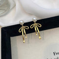 Cold sense pearl bow stud earrings niche light luxury high sense earrings cold wind temperament versatile commuter earrings