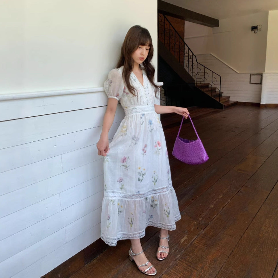 Gentle high-waisted V-neck floral cotton and linen puff sleeve dress