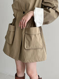 Korean medium and long stand-up collar loose drawstring trench coat women's autumn new big pocket design coat