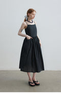 Summer new casual double-root sunscreen light and solid color medium and long suspender dress