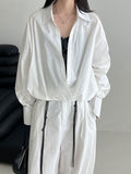 Korean high-texture large V-neck stacked shirt women's autumn lazy design hem waist shirt