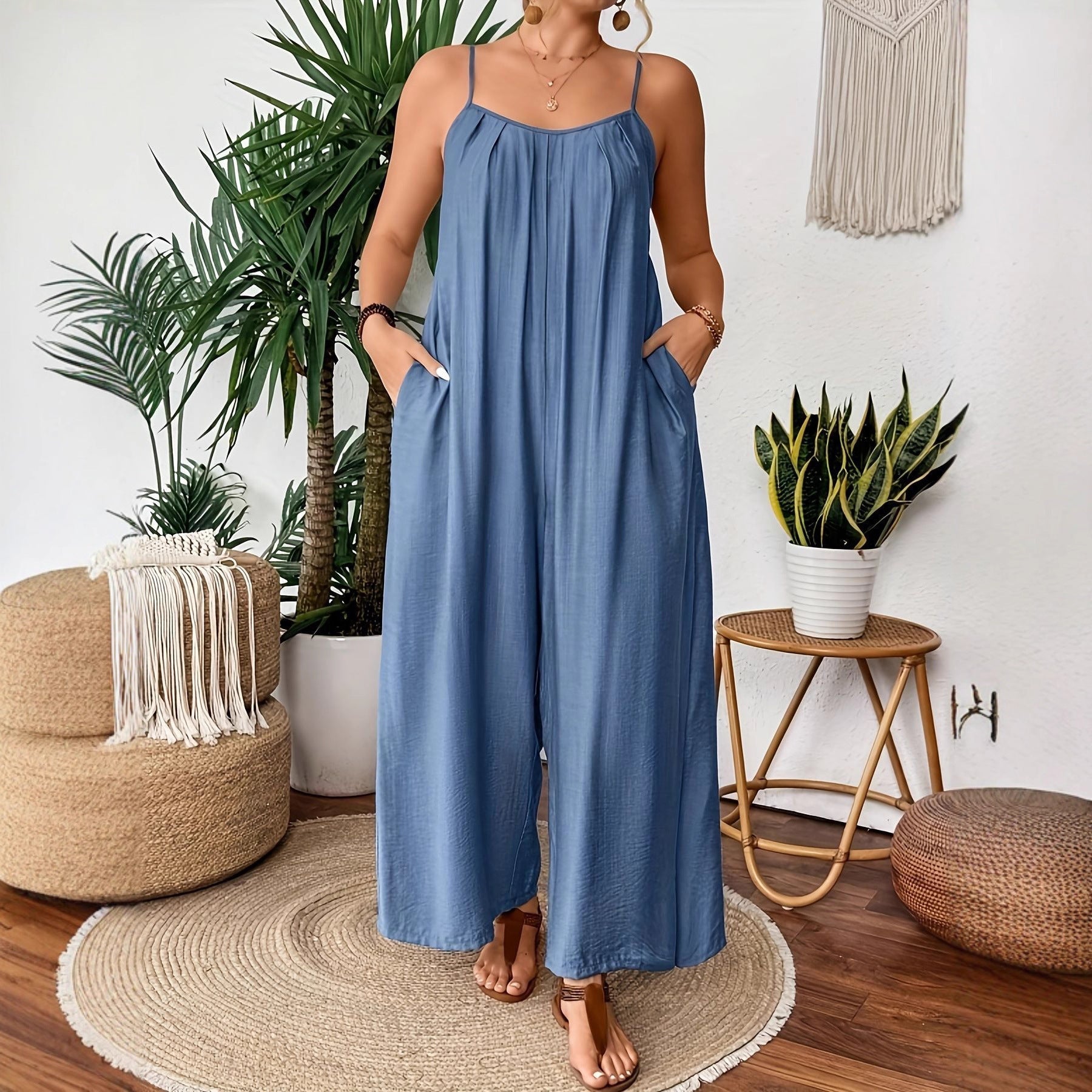 New large size solid color pocket temperament casual suspender wide leg jumpsuit