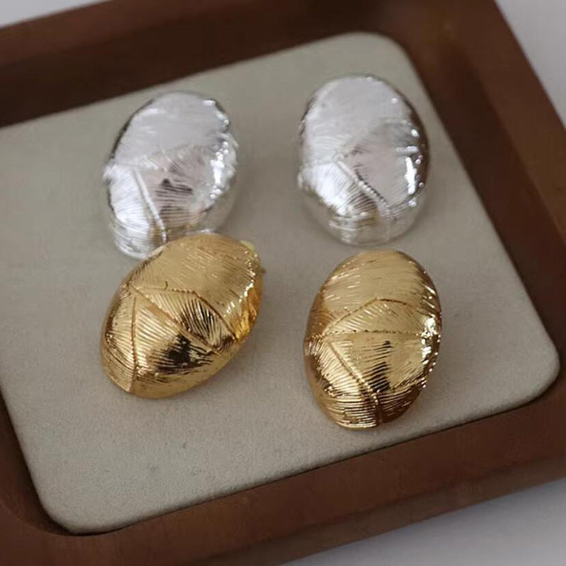 Folded stud earrings exaggerated metal line texture heavy industry earrings fashionable atmosphere ear jewelry