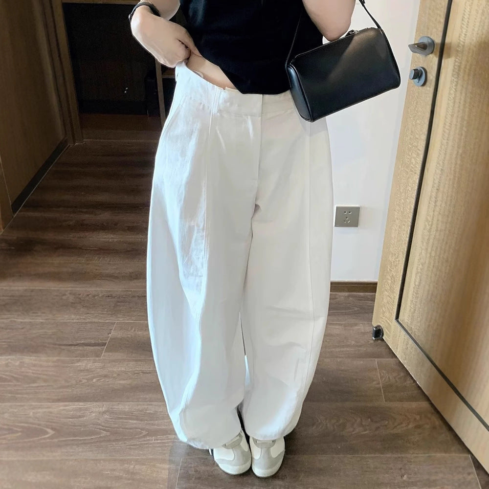 Minimalist white scimitar slacks