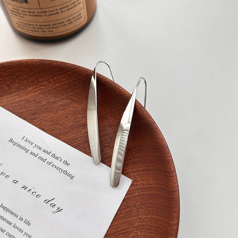 New Korean version glossy long stud earrings long temperament women's simple versatile ear hanging earrings